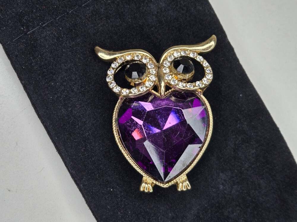 Monet Gold Tone Owl Brooch with Purple Heart Glass and Rhinestones